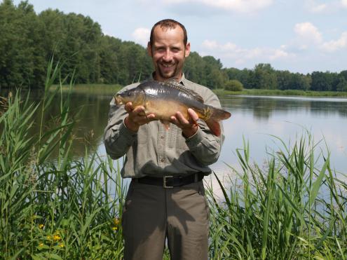 Teichwirt mit Biokarpfen; Foto: D. Uecker